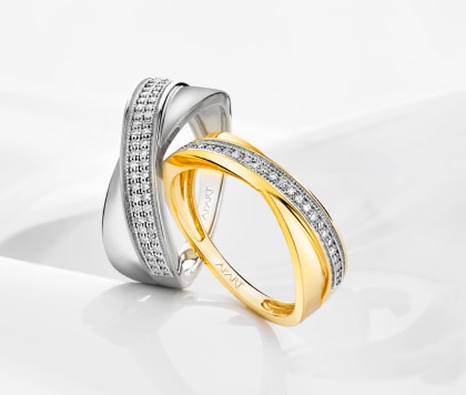 Yellow and white gold rings with diamonds