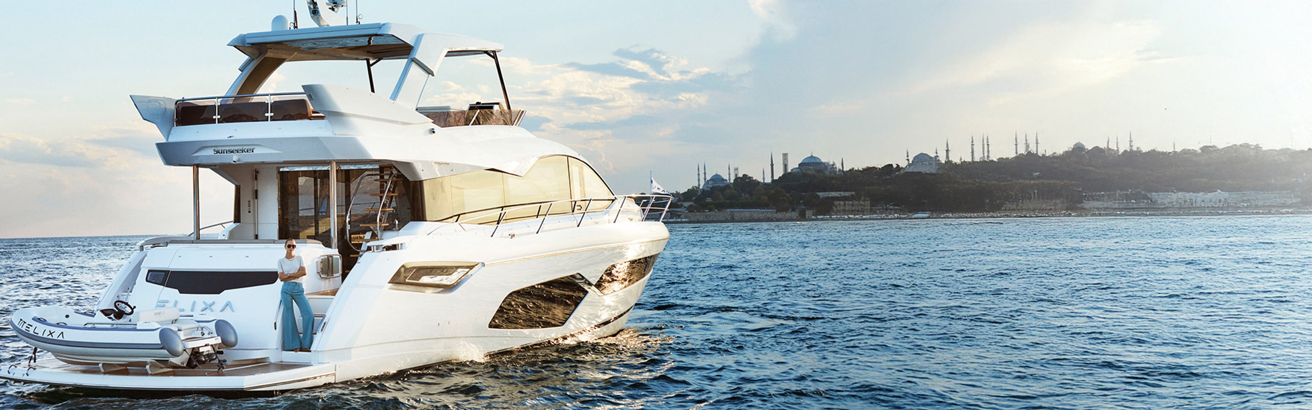 Zosia Nowak in a session on a boat with the sea in the background
